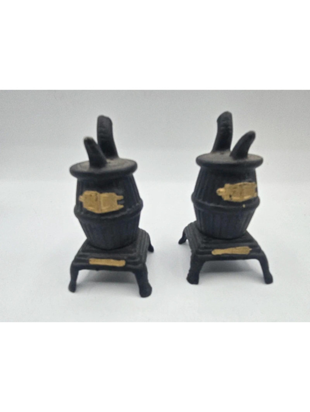 Vintage plastic pot belly stove salt and pepper shakers